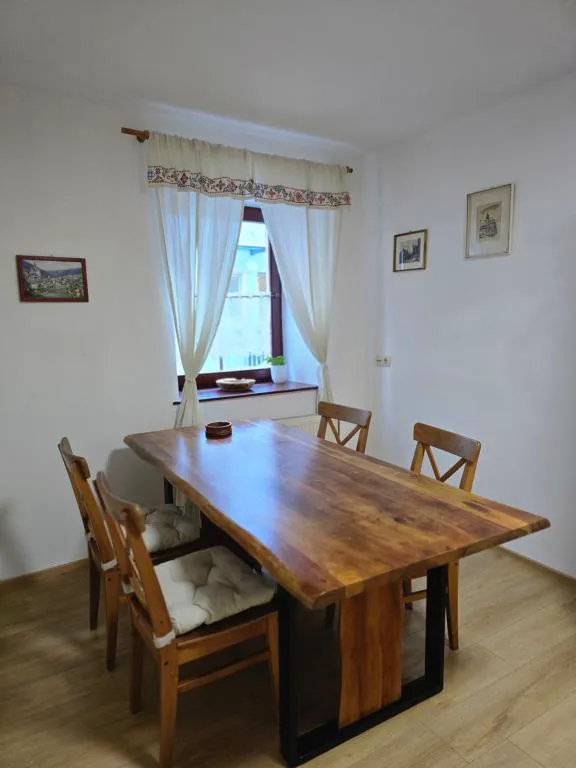 Wooden dining table and chairs at Sager House